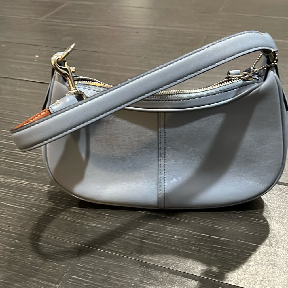 Never been used baby blue coach purse